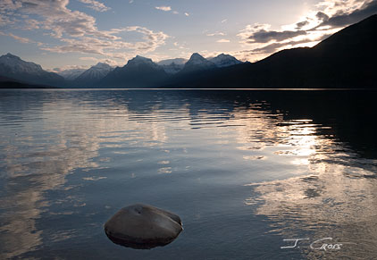 Lake McDonald at sunrise on Glacier National Park's 100th anniversary, Montana, U.S.