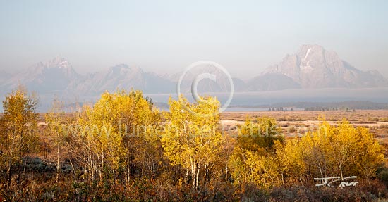 The Teton Range obscured by smoke from area wildfires, Grand Teton National Park, Wyoming, U.S.