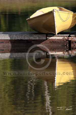Yellow rental boat on Glacier National Park's Lake McDonald