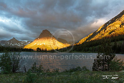 Pray Lake and Sinopah Mountain in a stormy sunrise, Glacier National Park, Montana, U.S.