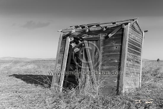Crumbling outhouse in Ninepipe NWR, Montana, U.S.
