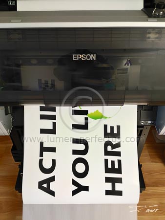 A sign being printed for the April, 2017 'Climate March'