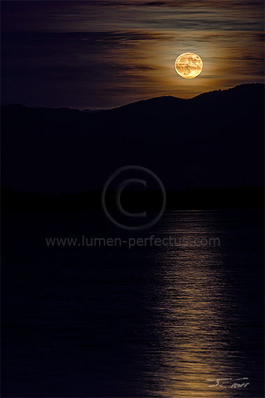 The Halloween full moon rises over Montana's Flathead Lake