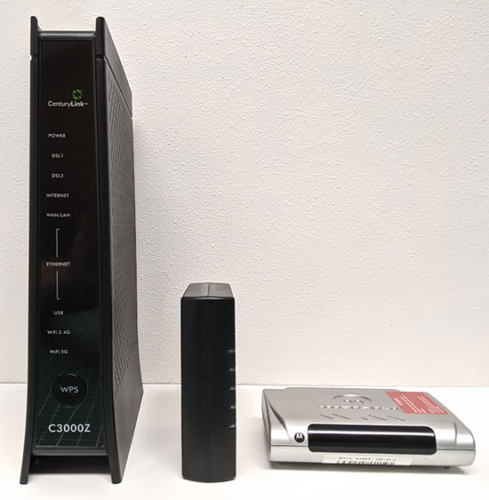 Two old DSL modems, and the new Zyxel C3000Z modem/router