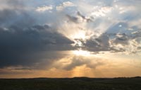 Stormy sky at sunrise, Wind Cave National Park, South Dakota, U.S.