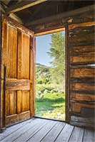 The view south through a cabin door, Bannack, Montana, U.S.