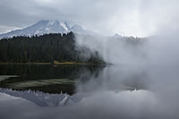 Morning fog obscures Mount Rainier in Mount Rainier National Park, Washington, U.S.