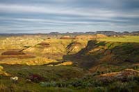 Sunrise lights the Terry Badlands in eastern Montana