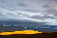 Sunset lights the hills near Montana's Flathead Lake