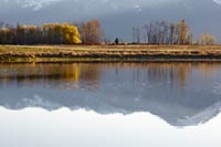 The Mission Mountains reflected at Ninepipe NWR, Montana, U.S.